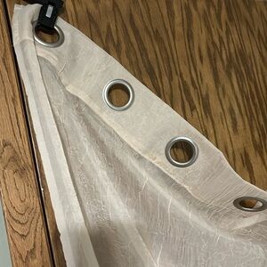 Curtains. Cream sheer - 4 piece. Each is 50x 84. Silver grommets Unbranded.